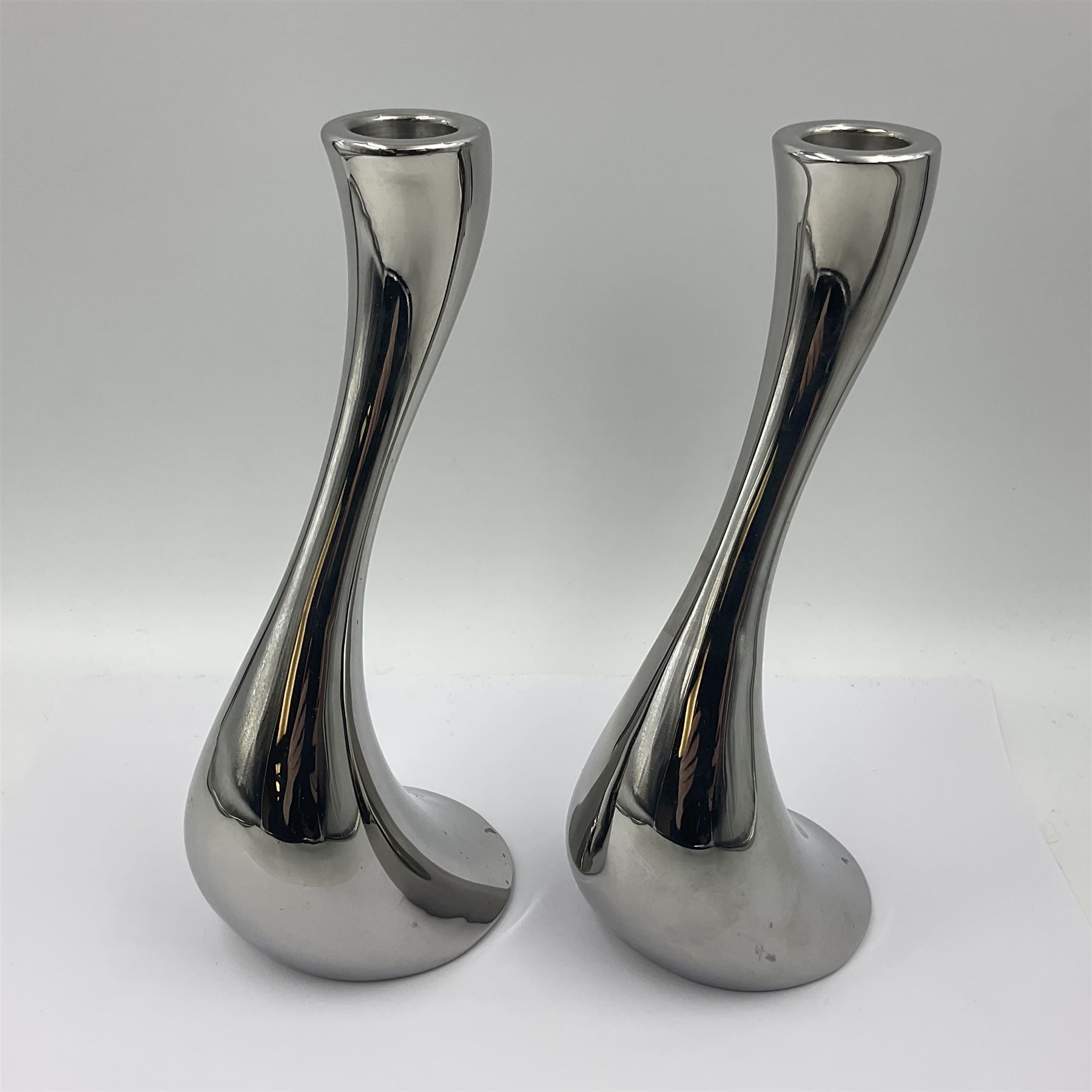 Pair of Georg Jensen chrome 'Cobra' candlesticks, with stamped maker's mark to base, H20cm