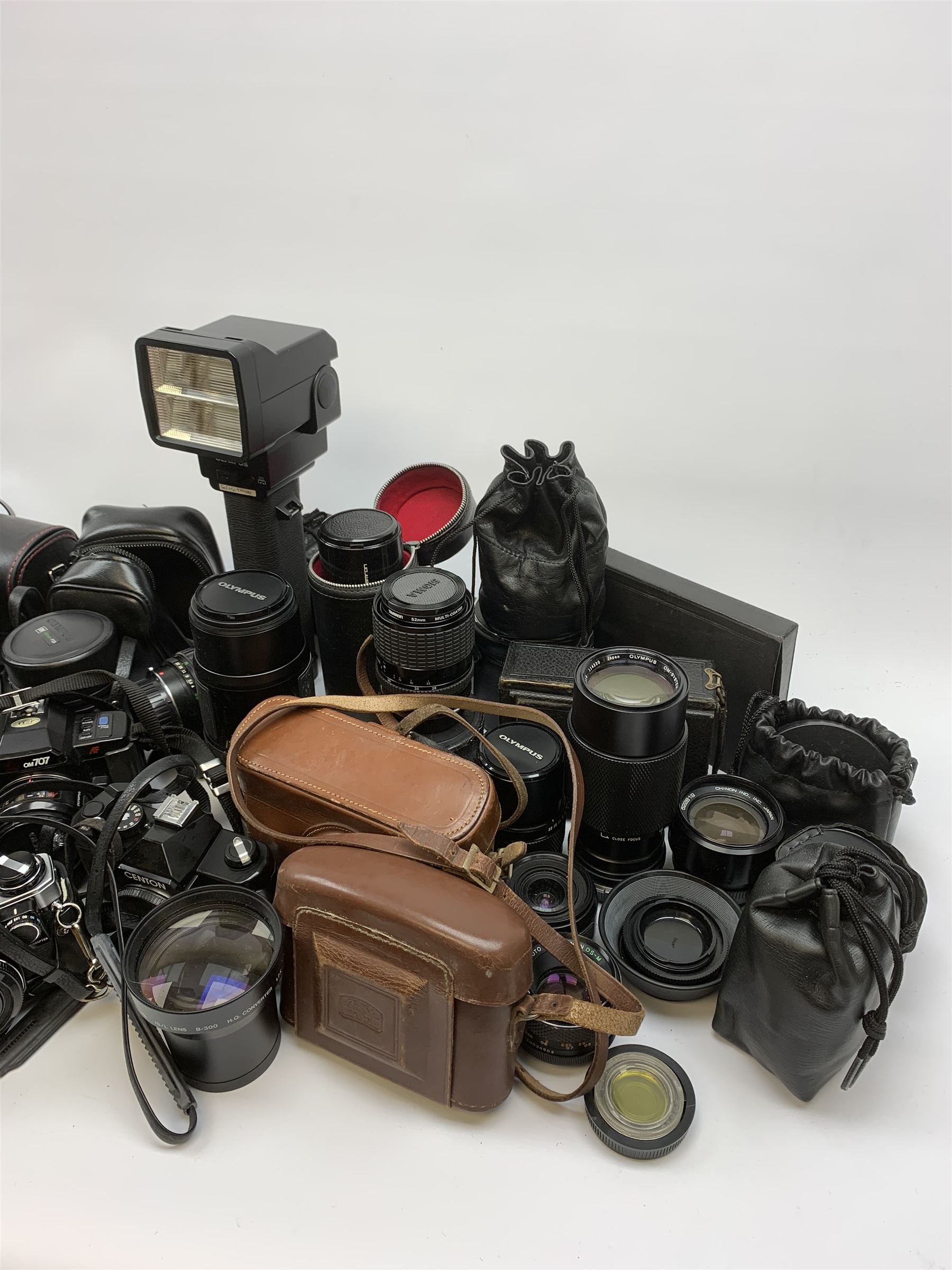 Vintage cameras lenses and accessories including Olympus 'OM10' camera body, Olympus 'OM4' camera, 'Olympus OM-System Zuiko auto-zoom 35-70mm 1:4' lens, various other lenses, tasco binoculars etc, in one box