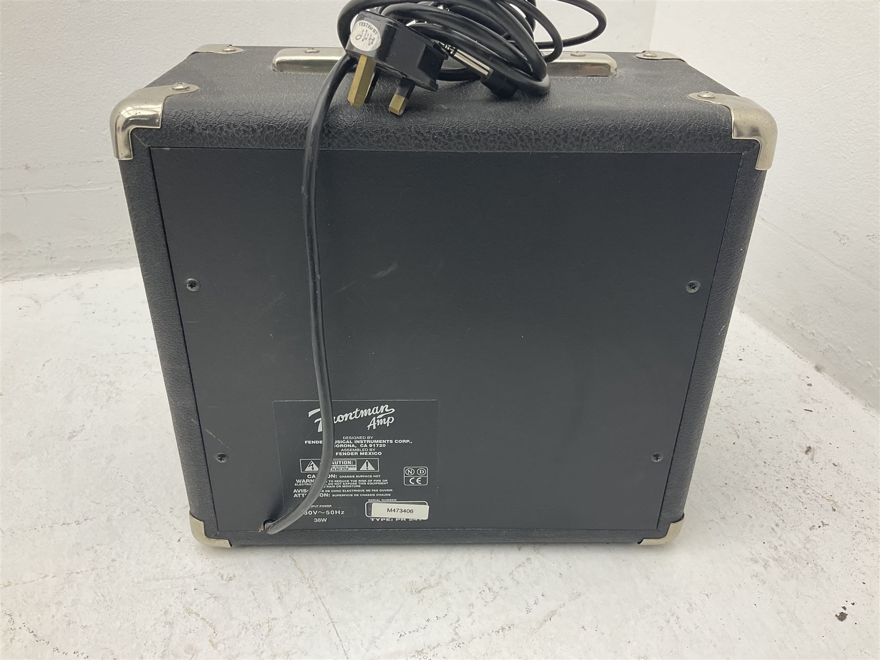 Fender style sunburst electric guitar with manuscript mark 'Zenta Stratocaster 1963' L97cm; in hard carrying case; another similar unmarked sunburst electric guitar; in gig bag; and Fender Frontman Amplifier, serial no.M473406 (3)