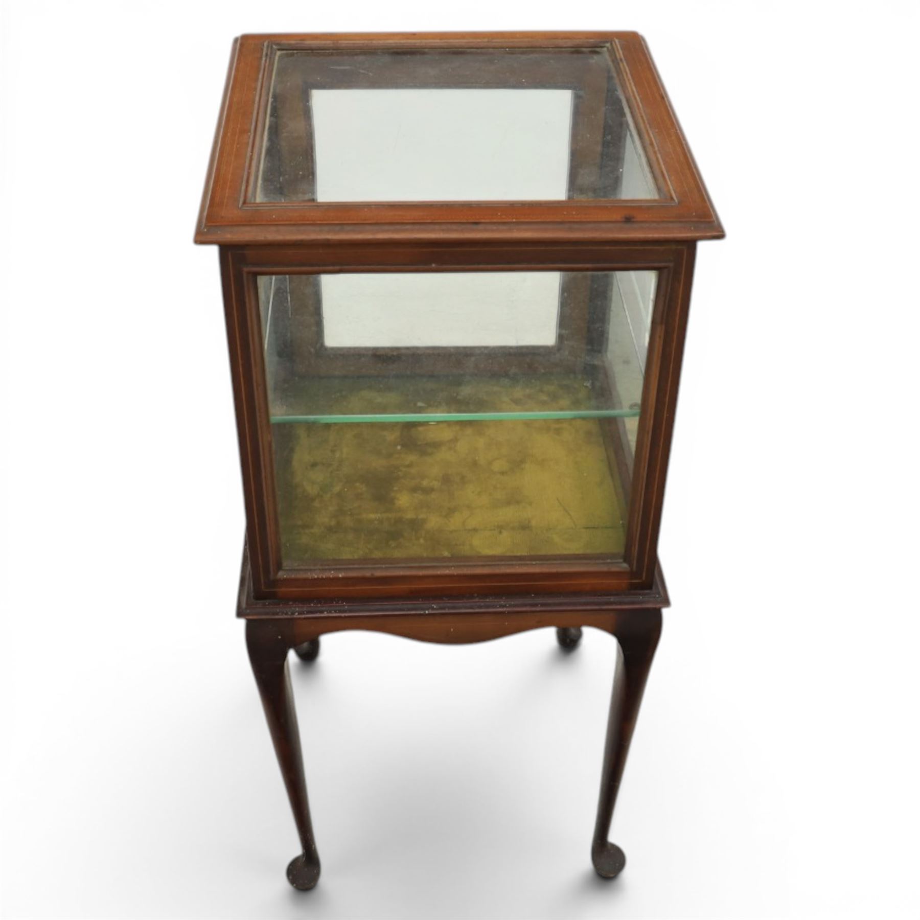Edwardian bijouterie two tier table, glazed top and sides with inlay surround, glazed door enclosing a single shelf and baized lined interior, raised on cabriole supports