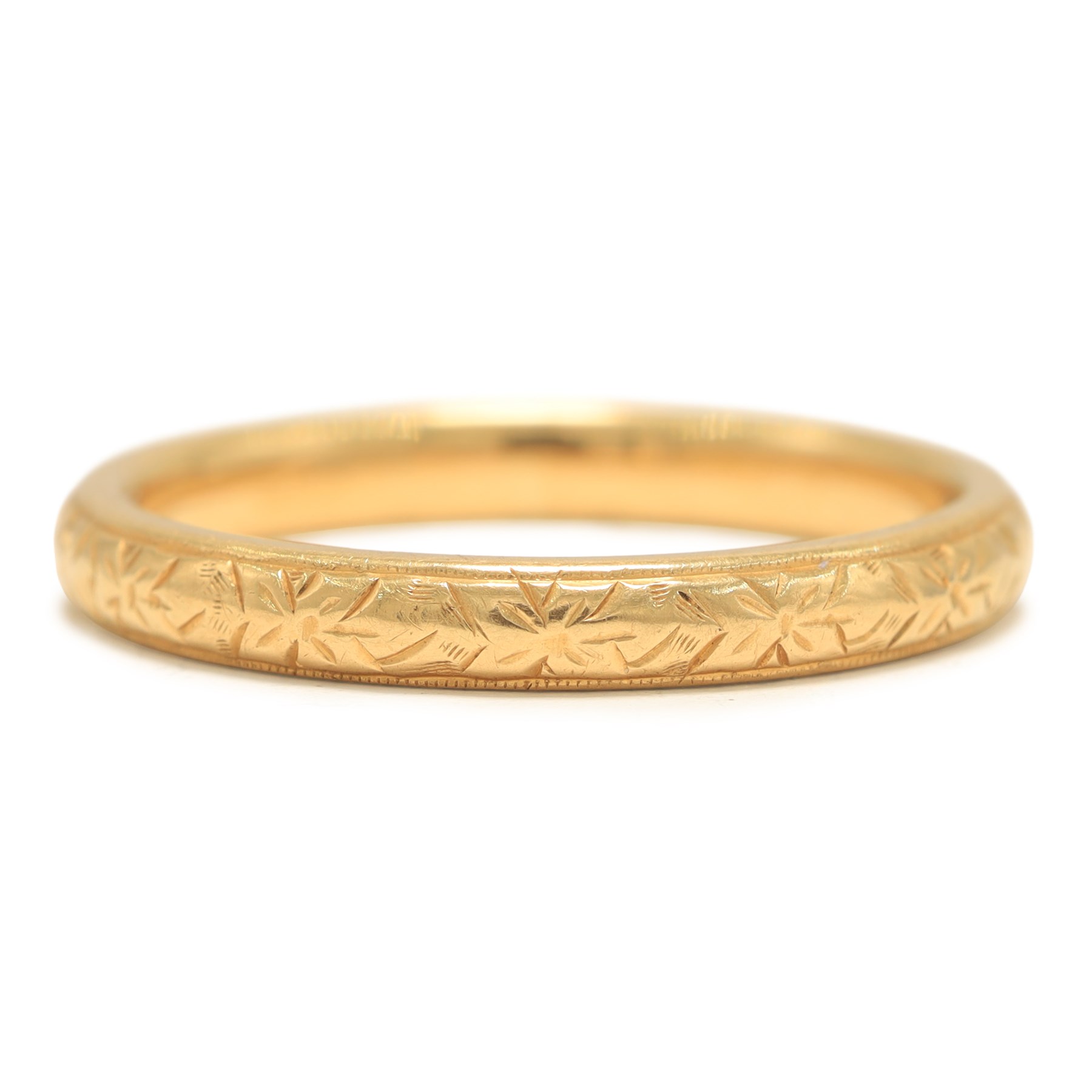 18ct gold wedding band old wedding band, the inside engraved 'Fidelity', the shank with engraved decoration, Chester 1954