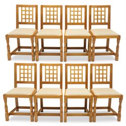 Knightman - eight oak dining chairs, the rectangular back with square section lattice spla...