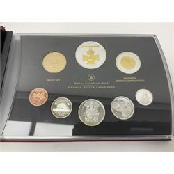 Queen Elizabeth II The Royal Canadian Mint 2006 silver proof dollar and two 2006 proof sets of Canadian coinage, all cased with certificates 