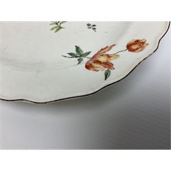 Mid 18th century Chelsea red anchor period plate, circa 1752-1758, of circular form hand painted with floral sprays and sprigs, the wavy edge with iron red rim line, with painted red anchor mark beneath, D21cm