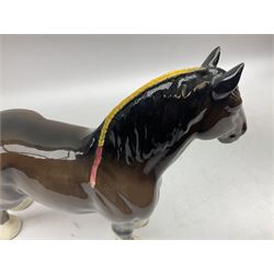 Royal Doulton ‘Troy’ racehorse figure on wooden plinth and two Beswick bay Shire horses, all stamped beneath