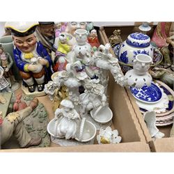 Collection of ceramics to include Royal Doulton Winston Churchill toby jug, Capodimonte style figures, novelty brandy decanter etc, in two boxes