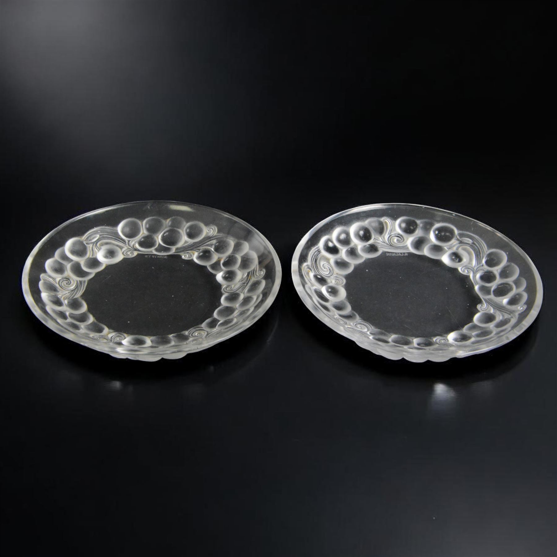 Rene Lalique (French 1860-1945), pair of Marienthal pattern glass ice cream plates, model 3034, designed circa 1930, acid etched R Lalique France beneath, D18cm