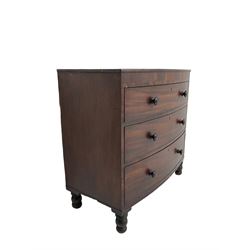 Early 19th century mahogany and mahogany banded bow-front chest, plain frieze over over three drawers, on turned feet
