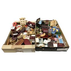 Large quantity of 1970s doll's house furniture, predominantly stained or painted wooden, including lounge, dining room, kitchen and bedroom pieces, bathroom fittings, bureaux and desks, piano, lamps, fire-surrounds etc; various scales