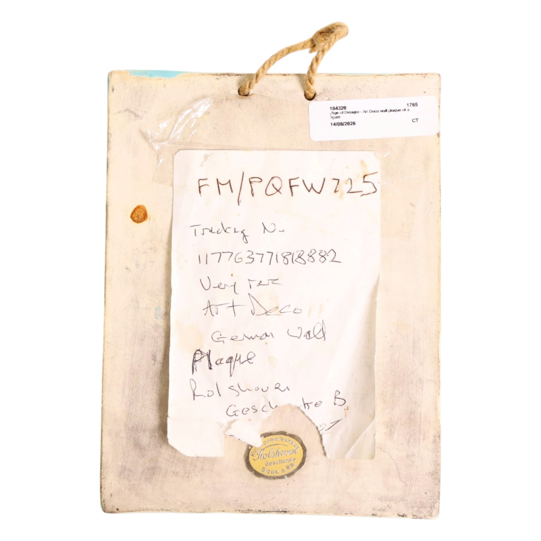 German Art Deco wall plaque, decorated with a female figure, in a hat upon a blue ground, with retailers sticker to the back 'kunstgewerbehaus Rolshoven', H19cm 