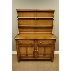  Ercol golden dawn elm dresser, two drawers and two cupboards, raised plate rack, W123cm, H160cm  