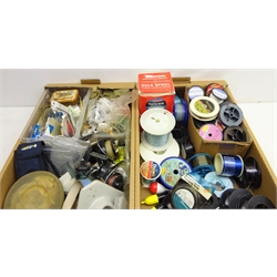  Quantity of fishing tackle including large number of spools of fishing line, fishing reels, unused hooks in packets, lures etc, in two boxes  