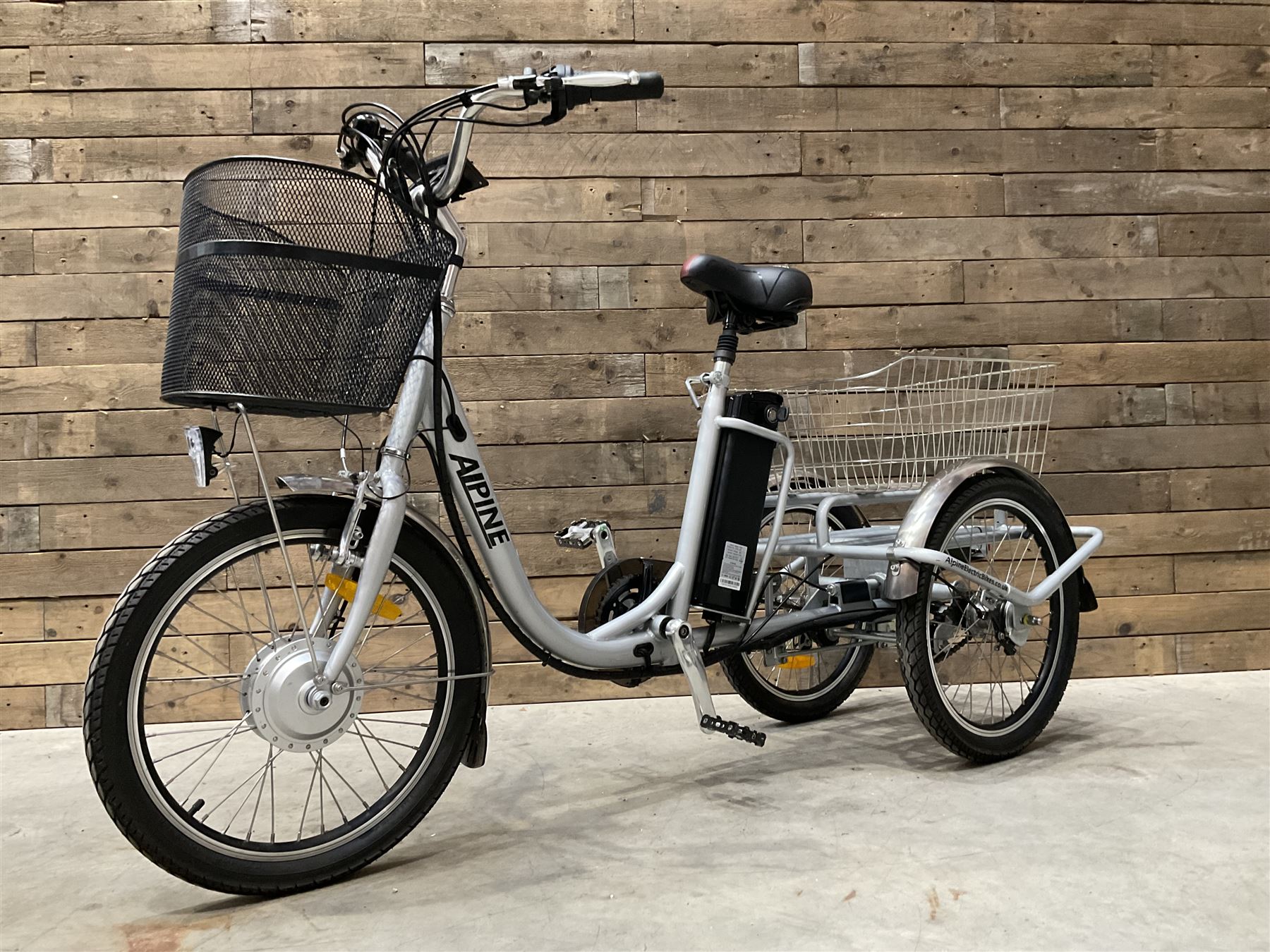 Alpine electric tilt trike - power assisted with throttle (no need to pedal), 15.5mph with 40 mile range, only 37 miles from new, silver finish, removable battery with charger, YoungDo gell seat with cover, £2749 new.