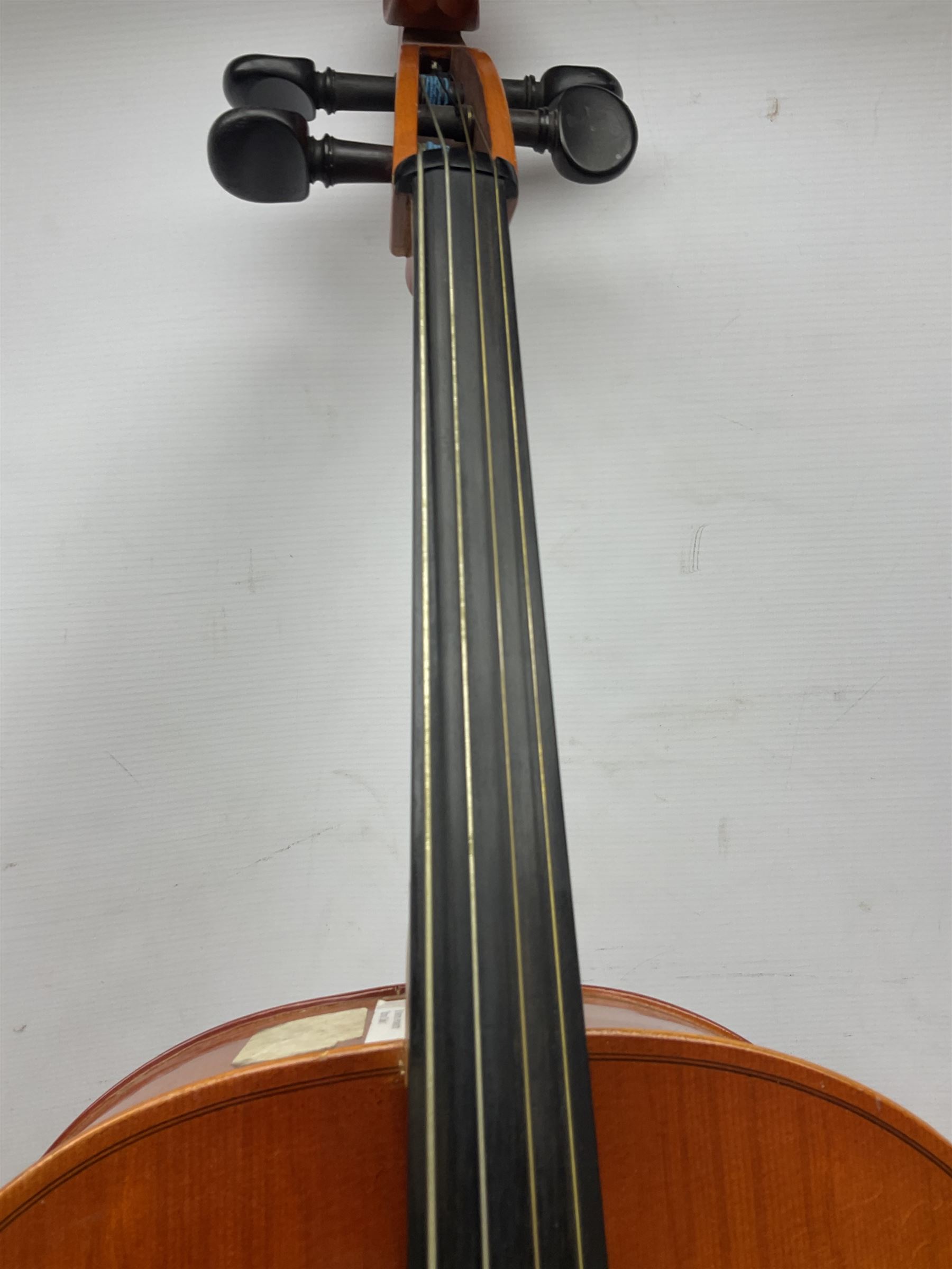 Modern Hungarian half-size cello with 69cm two-piece maple back and ribs and spruce top L114cm overall; and Stentor half size cello bearing label 'The Stentor Student II'; each in soft carrying case (2)