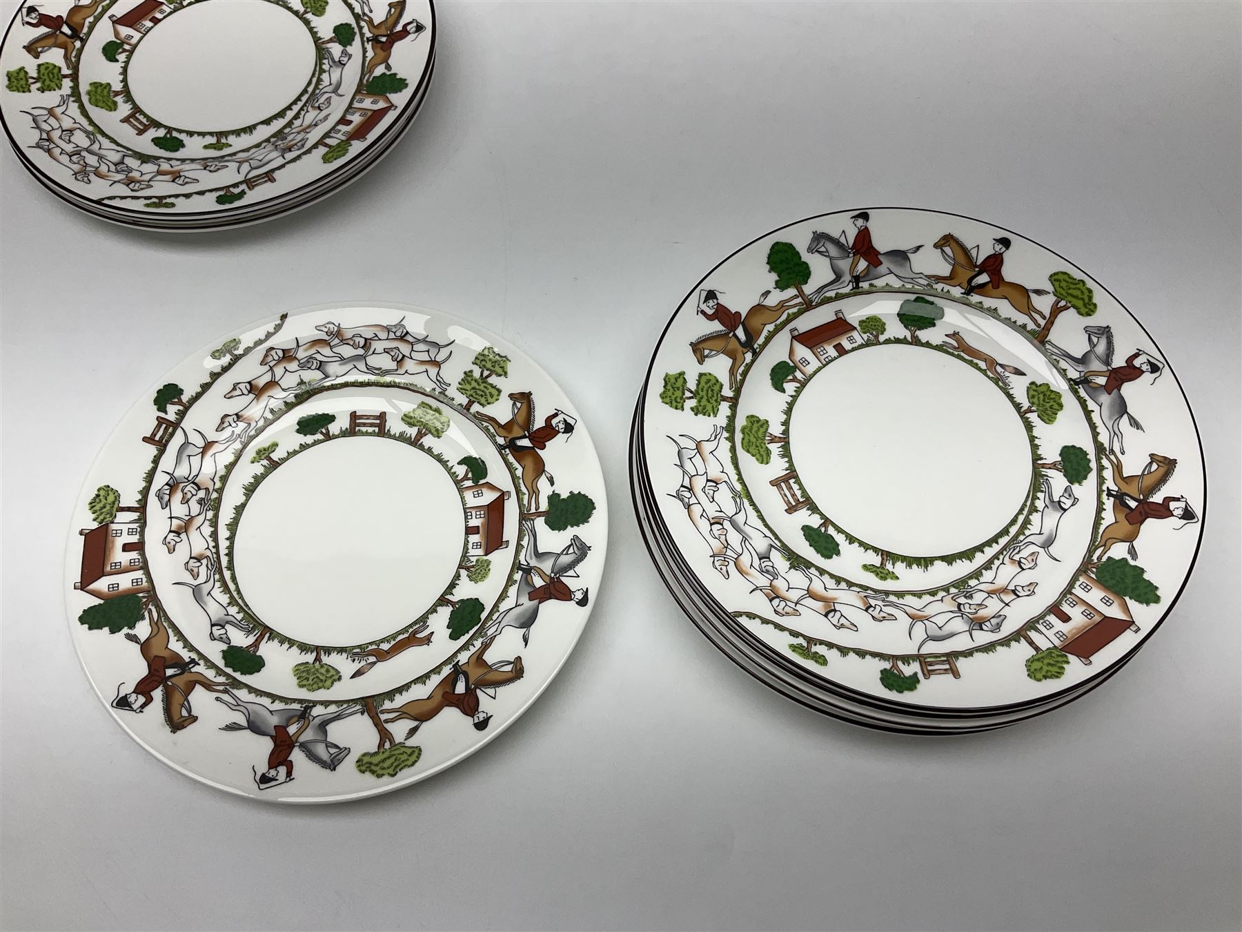 Wedgwood Hunting Scenes dinner and tea service for ten, to include dinner plates, side plates, dessert plates, cups and saucers, mugs, two large teapots, two milk jugs, etc, together with matching items by coalport and Staffordshire (94)