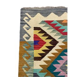 Anatolian Turkish Kilim rug, multi-coloured ground, decorated with geometric stepped lozenges with in a scrolled border