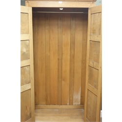  Narrow panelled oak double wardrobe, projecting cornice, enclosed hanging rail, W89cm, H183cm, D48cm  