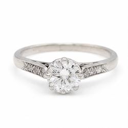 Platinum diamond ring, single round brilliant cut diamond of approx 0.85 carat, with diamo...
