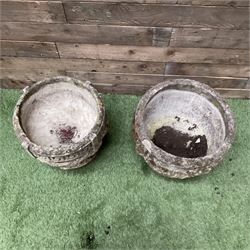 Pair of cast stone planters decorated in grapes