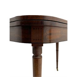 George III mahogany tea table, D-shaped fold-over top with rosewood band, the frieze inlaid with stringing, double gate-leg action base, on collar turned supports with bass cups and castors