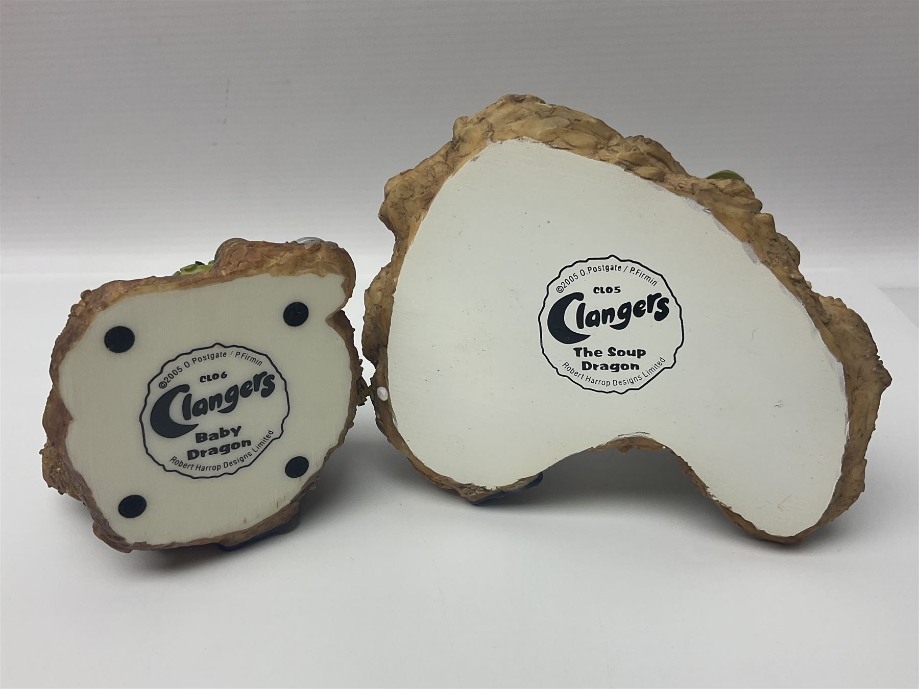 Eleven Robert Harrop figures from various collections, comprising limited edition The Trumpton Fire Engine Musical Box CGMB8 no. 359/1000, The Dragon from the Red Knight BN09, Bulldog Fireman DP165, Pointer Fire Chief DP184, Dalmatian New York Fire Fighter DP234, Dalmatian Fire Fighter DP191; Desperate Dan ‘Fireman Dan’ BDS11, Cuthbert CG13, Pugh (Clarinet) CG70, The Soup Dragon CL05 and Baby Dragon CL06