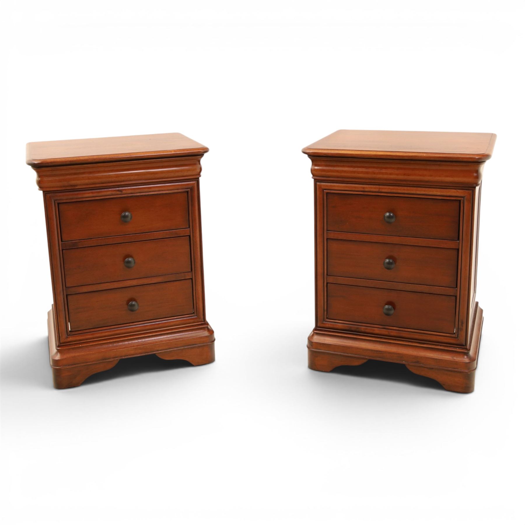 Willis & Gambier - mahogany pair of bedside cabinets, with frieze drawer with blue baize lined interior, panelled sides and three drawers raised on bracket feet