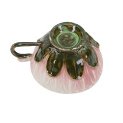 Two Zsolnay Pecs lotus moulded teacups and saucers, with impressed mark beneath