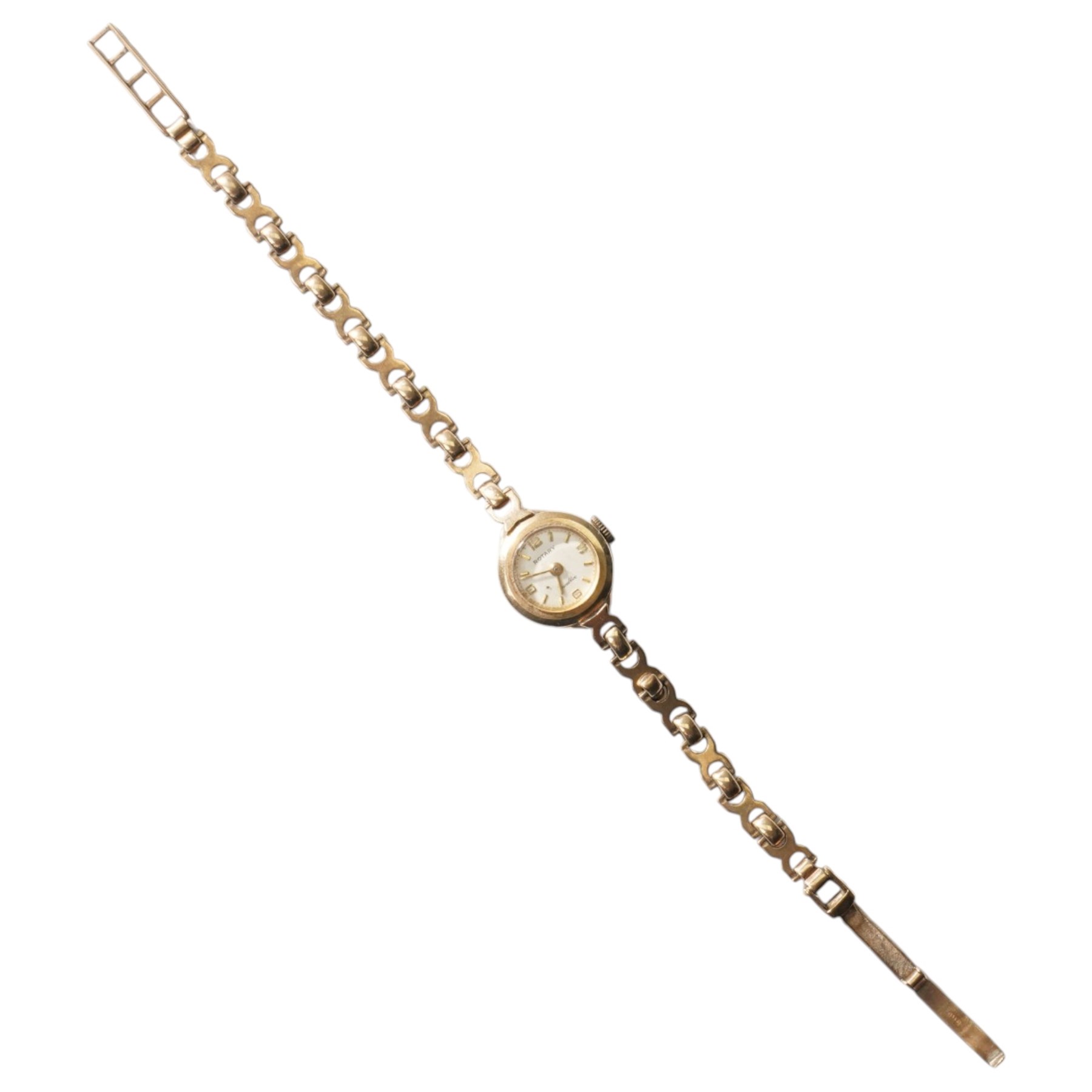 Rotary 9ct gold ladies manual wind wristwatch, on integral 9ct gold bracelet, hallmarked