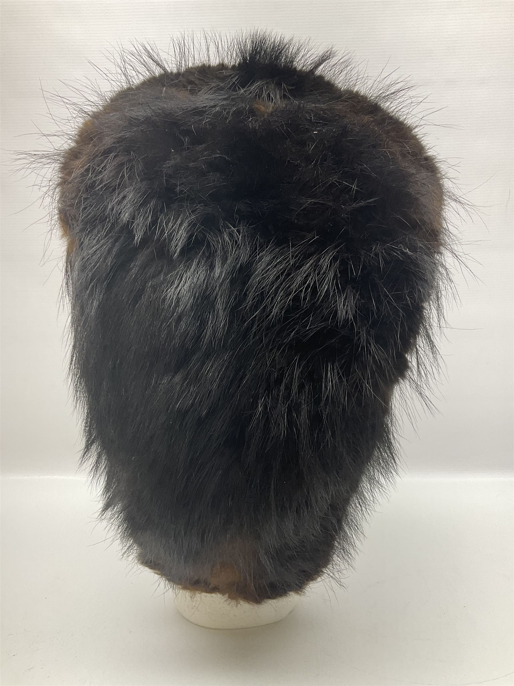 French Grenadier's bearskin hat, the embossed brass plate with crowned eagle, flaming grenades and arrow flashes; leather headband and traces of manuscript label internally