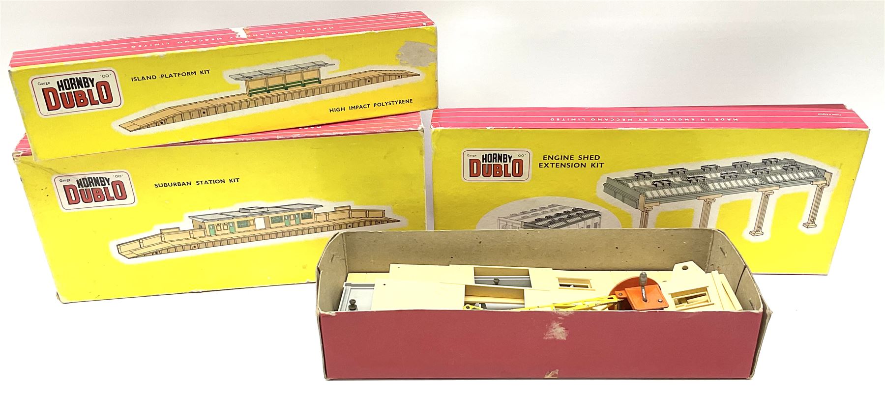 Hornby Dublo - 5006 Engine Shed Extension Kit; 5085 Suburban Station Kit with instructions; and 5030 Island Platform Kit; all in pictorial boxes; and Goods Depot Moulded Kit in box base only (4)