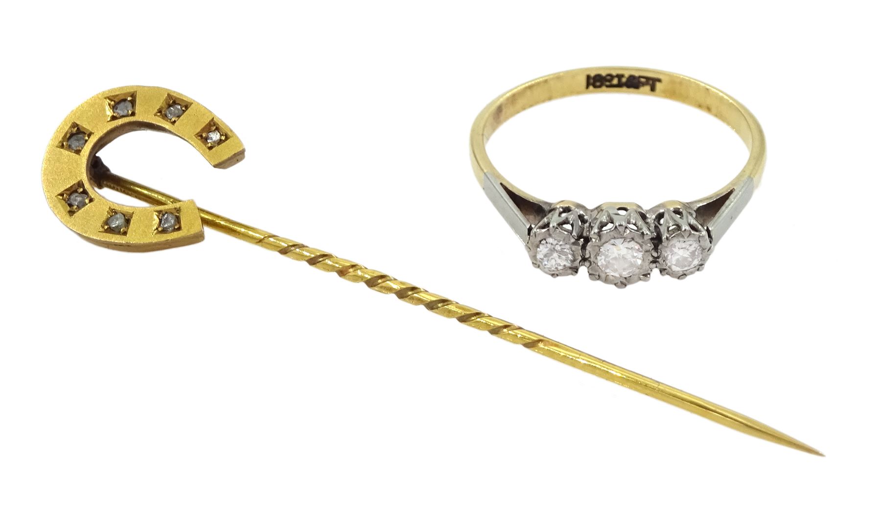 Early 20th century 18ct gold three stone old cut diamond ring, stamped 18ct Pt, total diamond weight approx 0.25 carat and a Victorian 9ct gold diamond horseshoe stick pin, hallmarked