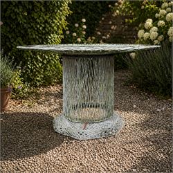 Two French early 20th century painted wicker octagonal garden tables, circular pedestals w...