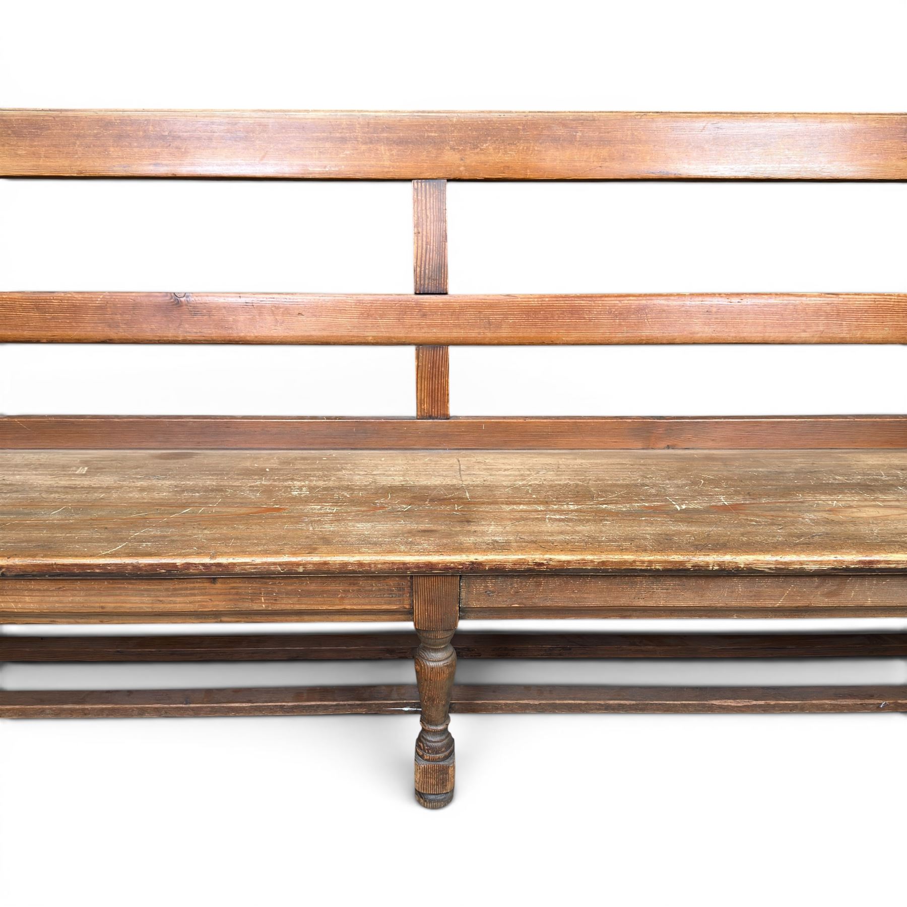 Early 20th century pine and oak bench seat, stained pine rail back frame with shaped oak arms