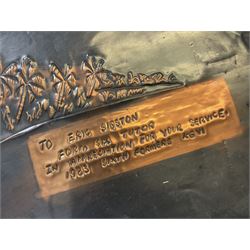 Collection of traditional necklaces from the Solomon Islands, including shell and boar tusk examples, together with a carved canoe prow, with mother of pearl eyes, painted cow hide and a copper plaque, depicting the Solomon Islands, with presentation engraving