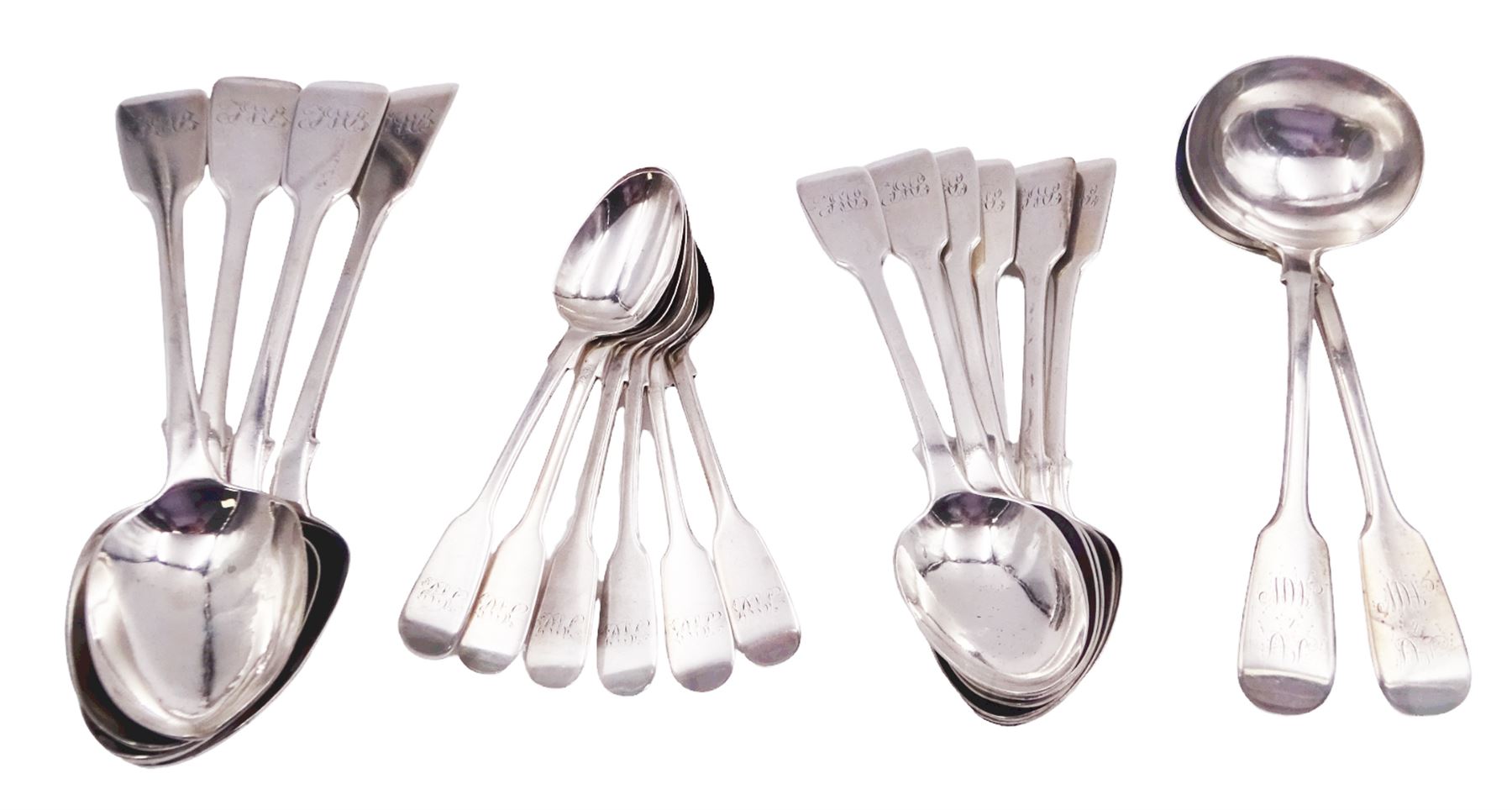 Group of Victorian silver fiddle pattern spoons, comprising pair of sauce ladles and set of six teaspoons, both hallmarked Henry Holland (of Holland, Aldwinckle & Slater), London 1857, set of four table spoons, hallmarked Chawner & Co (George William Adams), London 1857, and set of six dessert spoons, hallmarked Chawner & Co (George William Adams), London 1856, with monogrammed terminals, approximate total silver weight 25.50 ozt (792.6 grams)