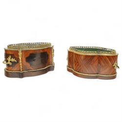 Matched pair of 19th-century French Kingwood and gilt brass mounted table jardinières, quatrefoil-shaped form with original zinc liners, foliate gilt brass mounted pierced gallery above kingwood crossbanded sides and inset serves style porcelain plaque and gilt brass carrying handles on plinth base