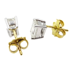  Pair of 18ct white gold emerald cut diamond stud earrings, hallmarked, diamonds total weight 1.8 carat  