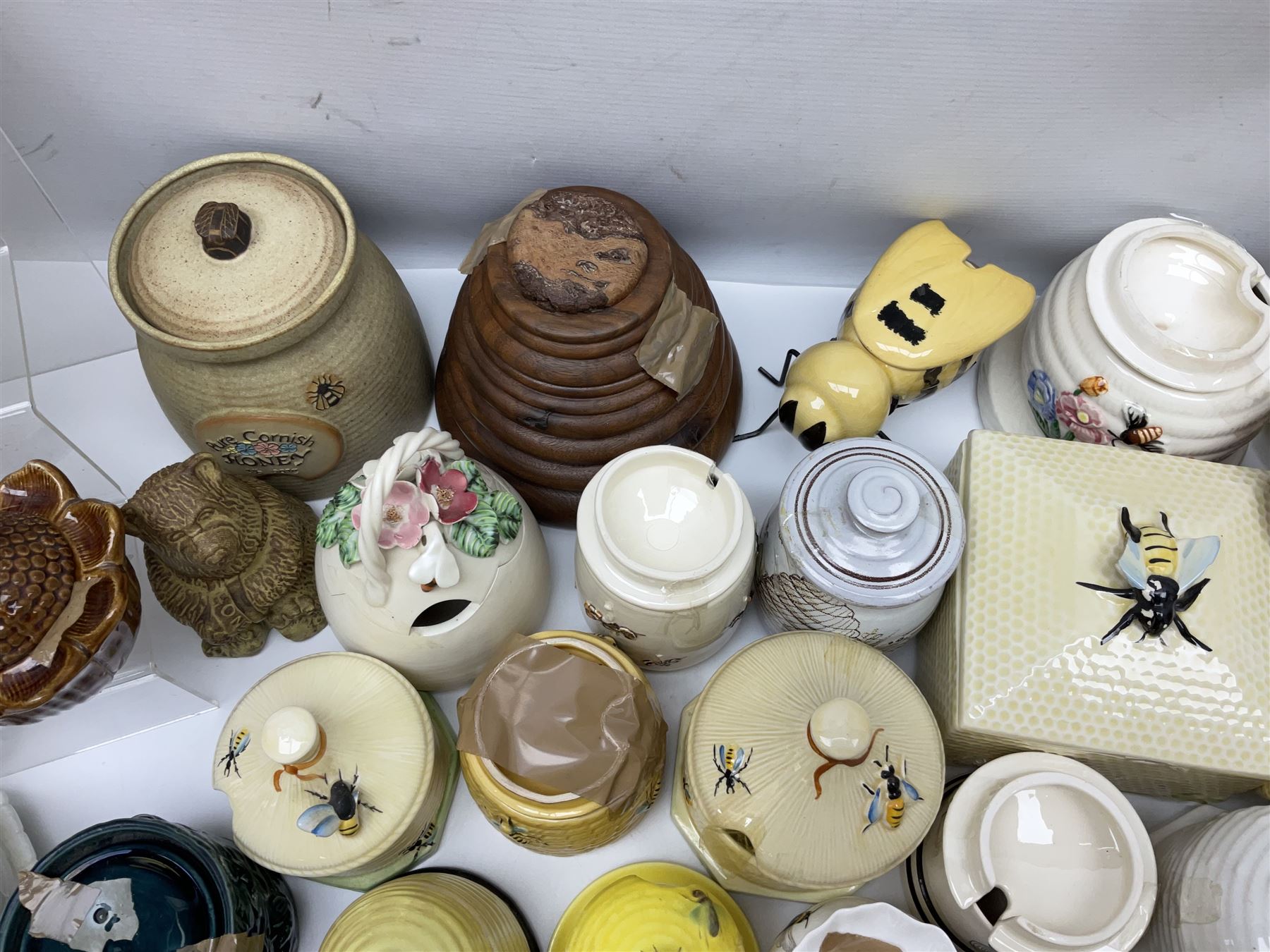 Large collection of honey pots, of various shapes, to include examples from Crown Devon, Marutomo ware, W.H Gloss, Goebel etc 