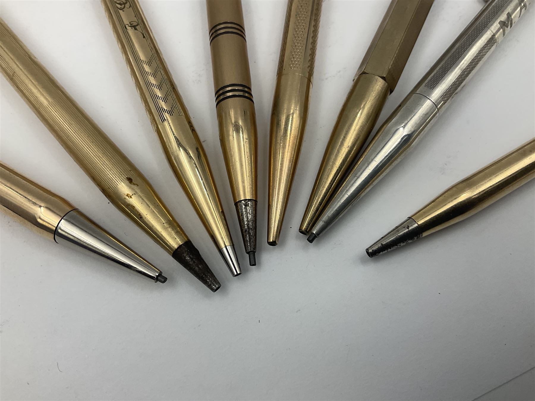 Five gold filled Wahl Eversharp propelling pencils, together with a silver propelling pencil, hallmarked London 1946, J.M.Co Johnson, Matthey & Co, and two further gold filled propelling pencils, one with box, largest L13cm (8)