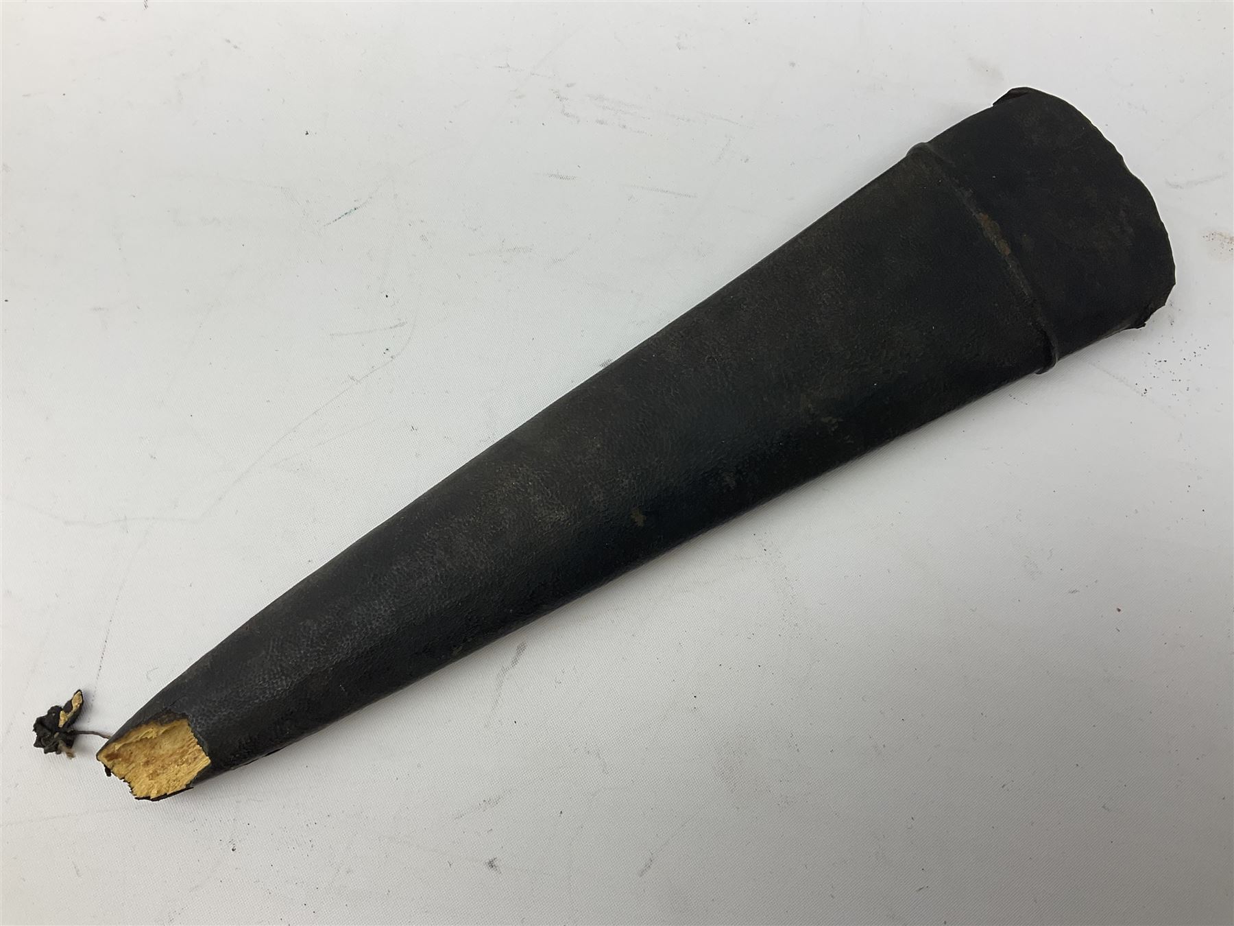 Indian thrusting dagger Katar the 25cm blade with swollen point and central rib, in leather covered wooden sheath L45cm overall