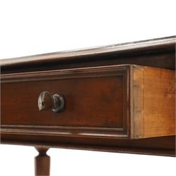 Mid Victorian four drawer mahogany partners' writing table, with leather inset top with moulded edge, with two frieze drawers to either side, on turned supports terminating in castors