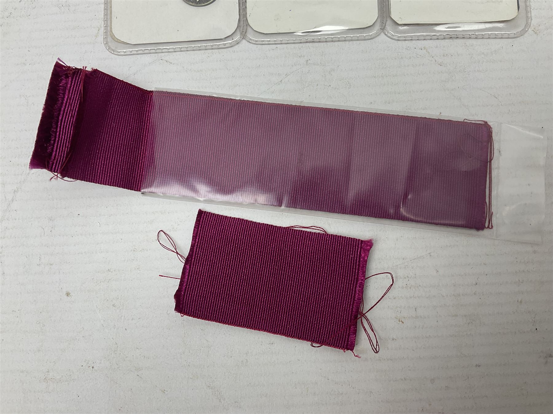 Two Imperial Service Medals to Elsie Hannah Ferguson and Fred Whitehead; each in original case; WWI Special Constabulary Medal to Inspr. Alfred W. Thompson; modern Prisoner of War Medal; cased; replica Victoria Cross and India Mutiny Medals with archive of information relating to Pte. Robert Newell V.C. 9th Lancers; replica Victoria Cross and George Cross with miniatures; and other replica medals etc