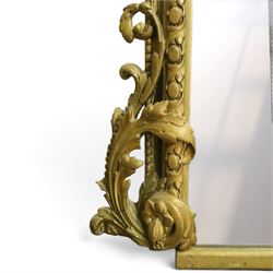 Large Country House late 19th century gilt framed overmantel mirror of arched form, the cartouche and scallop shell pediment over an egg-and-dart and beaded frame, the lower spandrels of scrolling foliate form with acanthus and flower head motifs
