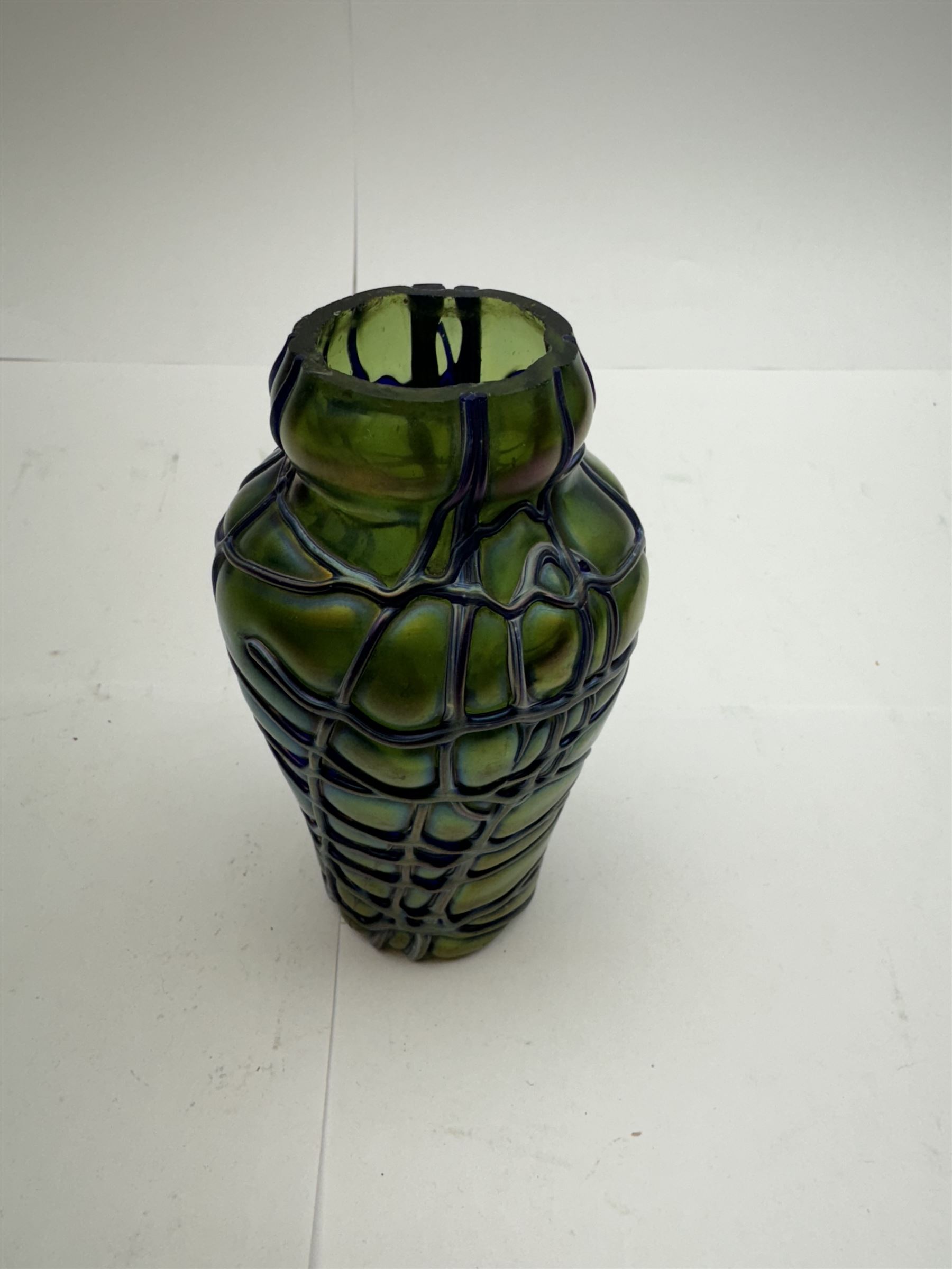 Three Austrian Art Nouveau Kralik iridescent glass vases, to include two of squat baluster form and a taller example, all green with threaded vein decoration to body, tallest H13.5cm