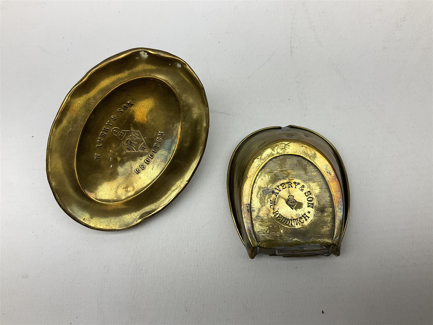 W Avery & Son brass oval pincushion in the form of a hedgehog, and horseshoe needle packet box both inscribed to base 'W. Avery and Son, Redditch', with registration mark, pin cushion L9cm 