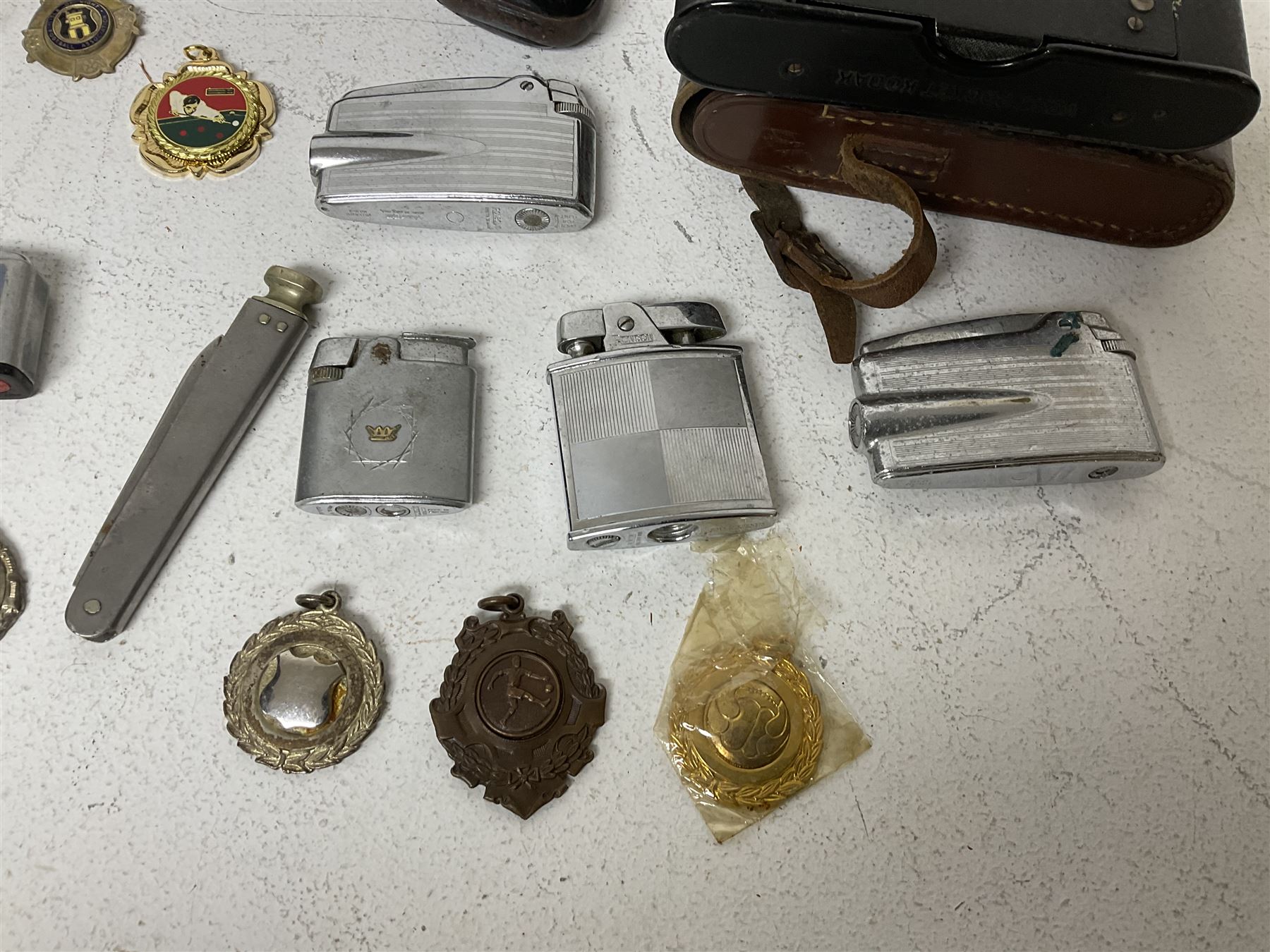 Webley junior air pistol, Kodak camera, collection of fob medals, lighters, etc