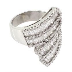 18ct white gold baguette and round brilliant cut diamond crossover ring, stamped, total diamond weight 3.25 carat