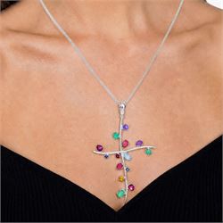 18ct white gold multi gemstone cross pendant necklace, vari-cut stones including emerald, ruby, pink and blue sapphire, red and blue stones, on a four strand box link chain necklace, stamped 750