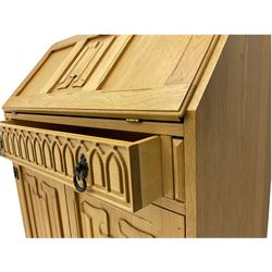 Light oak bureau, fall front above single drawer and two cupboards, carved linenfold detail