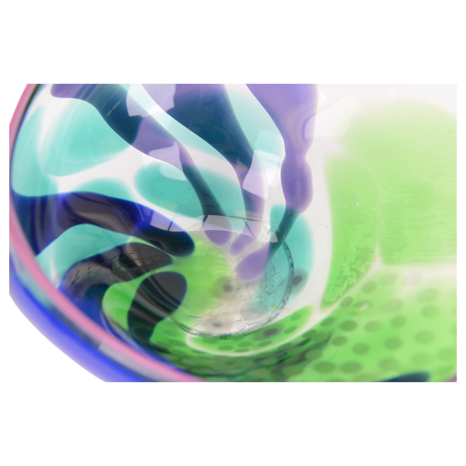 Jane Charles (British Contemporary): freeform studio glass bowl, with green, blue and purple flowing decoration, upon a textured circular foot, H16.5cm, D30cm